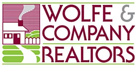 Wolfe & Company Realtors logo