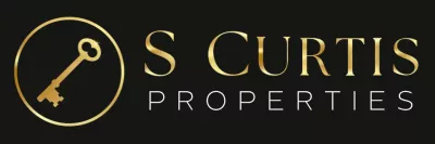 S Curtis Properties logo
